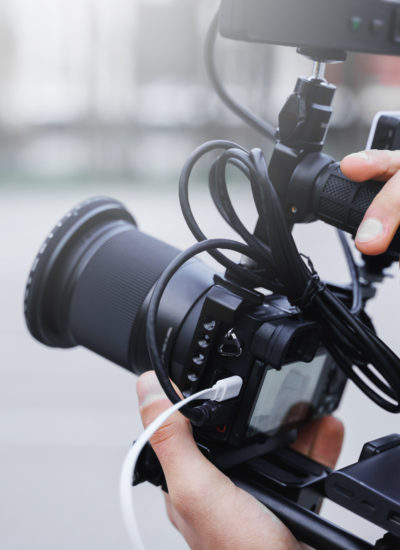 Videographer holding a camera